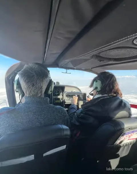 Private seaplane taking off from Lake Como near Como's Aero Club base